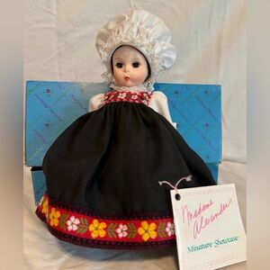 Madame Alexander Norway Girl (584)Doll Detailed black dress and laced bonnet.